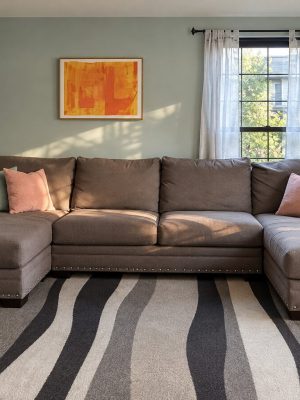 The living room sectional has room for the whole family on movie night.