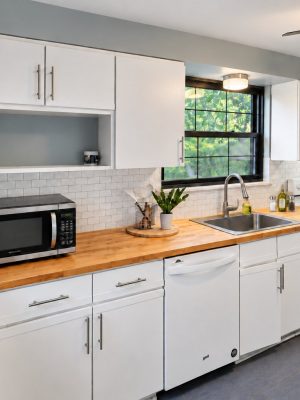 A full kitchen with butcher-block counters, a dishwasher and plenty of room to cook for a group.